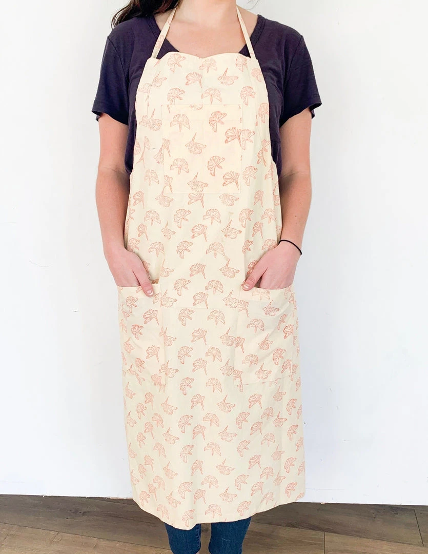 Symbology Dancing Umbrellas + Ginkgo Leaf Reversible Apron Home Goods 2 Symbology Dancing Umbrellas + Ginkgo Leaf Reversible Apron Home Goods