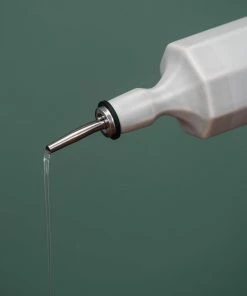 The Bright Angle Best Sellers Elixir Porcelain Olive Oil Bottle - Rosemary Green